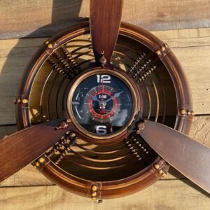 Pendule cuivre forme nez d'avion avec hélice